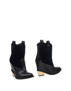 Полусапоги и высокие ботинки Giuseppe Zanotti