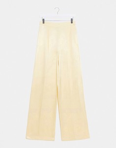 Атласные широкие брюки кремового цвета ASOS DESIGN-Желтый