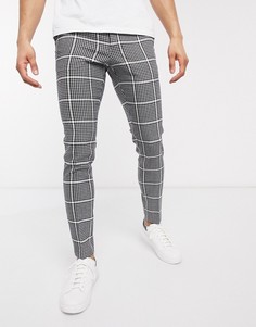 Супероблегающие строгие брюки в клетку черного цвета ASOS DESIGN-Черный