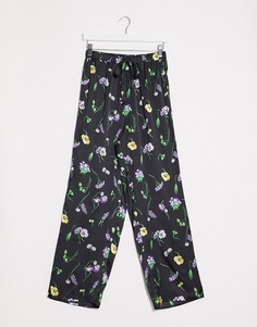 Атласные брюки от комплекта с цветочным принтом ASOS DESIGN-Черный