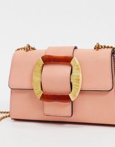 Сумка через плечо с массивной пряжкой ASOS DESIGN-Розовый