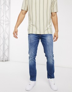 Синие суженные книзу джинсы Wrangler-Синий