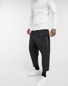 Брюки заниженного кроя в стиле милитари с принтом ASOS DESIGN-Черный