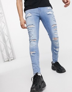 Голубые супероблегающие джинсы стретч с рваной отделкой ASOS DESIGN-Синий