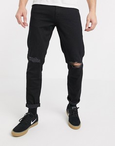 Черные суженные книзу джинсы стретч с рваными коленями ASOS DESIGN-Черный