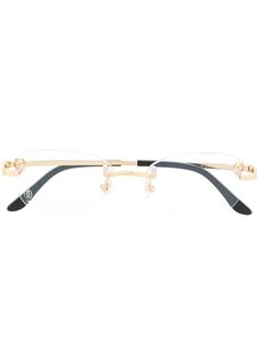 Cartier Eyewear очки в безободковой овальной оправе