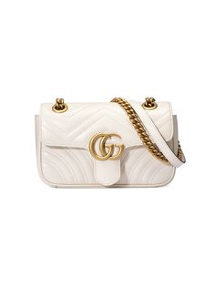 Gucci стеганая мини-сумка GG Marmont