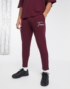 Джоггеры слим с вышитой надписью от комплекта ASOS DESIGN-Красный