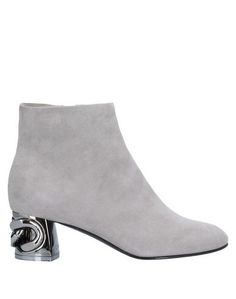 Полусапоги и высокие ботинки Casadei