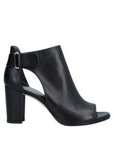 Полусапоги и высокие ботинки Stuart Weitzman