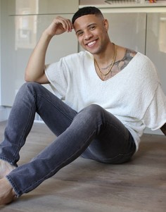 Черные супероблегающие выбеленные джинсы ASOS DESIGN-Черный