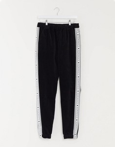 Бархатные узкие джоггеры черного цвета ASOS DESIGN-Черный
