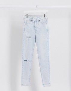 Джинсы с выбеленным эффектом и рваной отделкой Topshop-Синий