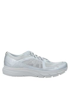 Низкие кеды и кроссовки Salomon