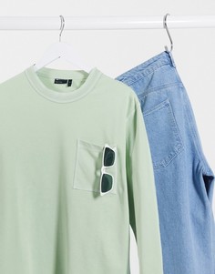 Зеленый свободный лонгслив с контрастной строчкой и карманом ASOS DESIGN