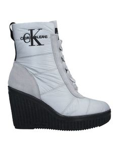 Полусапоги и высокие ботинки Calvin Klein Jeans
