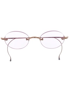 Garrett Leight солнцезащитные очки в овальной оправе
