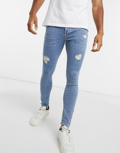 Голубые обтягивающие джинсы с потертостями ASOS DESIGN-Синий