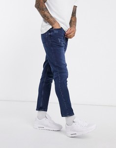 Суженные книзу темно-синие потертые джинсы ASOS DESIGN-Синий