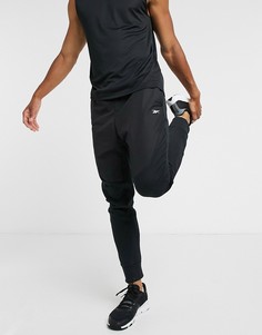 Черные джоггеры с флисовыми вставками Reebok Training-Черный