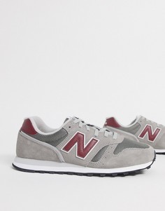 Серые кроссовки с красной отделкой New Balance 373-Серый