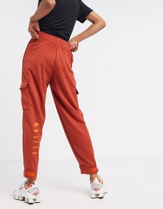 Джоггеры рыжего цвета с логотипом-галочкой и карманами Nike-Оранжевый