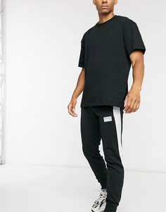 Черные спортивные брюки с принтом Puma Avenir-Черный