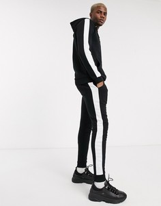 Черный спортивный комбинезон с полосками по бокам ASOS DESIGN