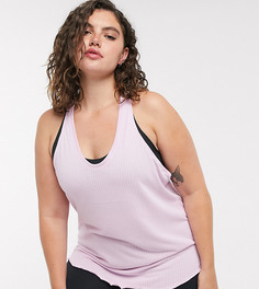 Розовая майка Nike Yoga Plus-Розовый