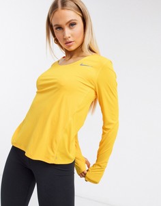 Желтый лонгслив Nike Running city