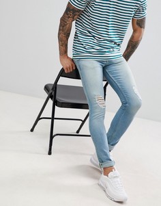 Голубые джинсы скинни с рваной отделкой ASOS DESIGN-Синий