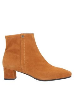 Полусапоги и высокие ботинки Stuart Weitzman