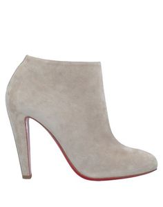 Полусапоги и высокие ботинки Christian Louboutin