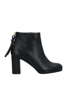 Полусапоги и высокие ботинки Stuart Weitzman