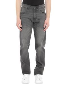 Джинсовые брюки Wrangler