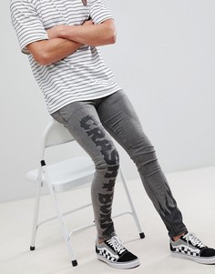 Черные джинсы супероблегающего кроя с принтом ASOS DESIGN-Черный