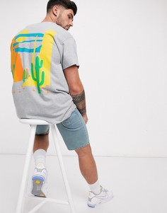 Свободная футболка с принтом пустыни на спине и карманом ASOS DESIGN-Черный
