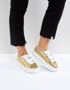 Золотистые кроссовки на платформе Puma-Золотой