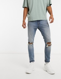 Синие супероблегающие джинсы до щиколотки со рваными коленями ASOS DESIGN-Синий
