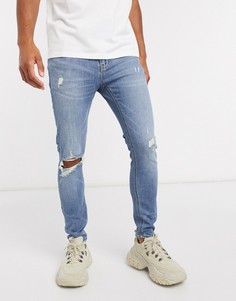 Эластичные супероблегающие джинсы с дырками на коленях ASOS DESIGN-Синий