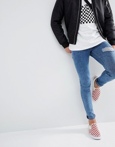 Синие джинсы скинни с эффектом кислотной стирки ASOS-Синий