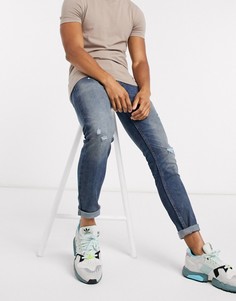 Супероблегающие потертые джинсы Levis 519-Синий Levis®