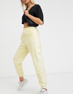 Желтые спортивные брюки adidas Originals adicolor-Желтый