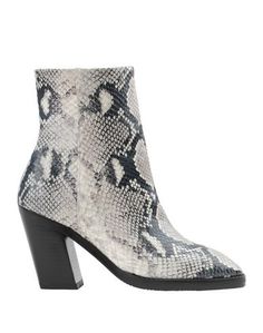 Полусапоги и высокие ботинки Stuart Weitzman