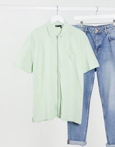 Пастельно-зеленое свободное поло с молнией и карманом ASOS DESIGN-Зеленый