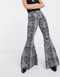 Расклешенные брюки со звериным принтом Free People-Мульти