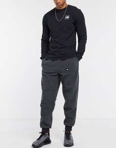 Серые флисовые брюки The North Face-Серый