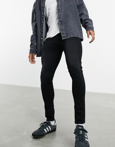 Черные выбеленные джинсы стретч с напылением и состаренной отделкой ASOS DESIGN-Черный