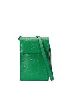 Gucci мини-сумка с тисненым логотипом GG