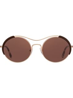 Prada Eyewear солнцезащитные очки в круглой оправе